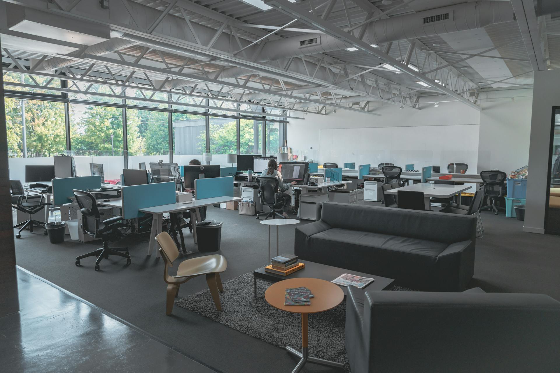 Modern open office with professional carpet flooring
